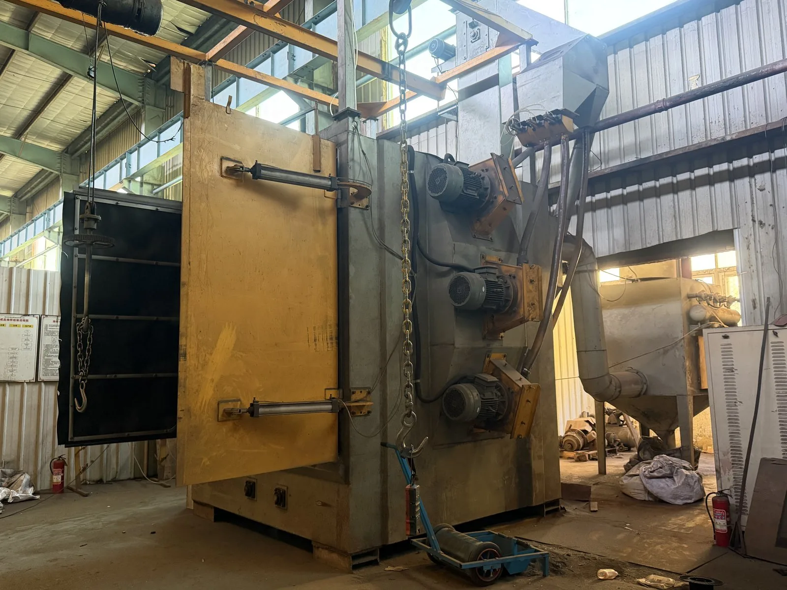 Shot Blasting to Sa 2.5, Then a Full-Size Paint Booth — PGI attachments manufacturing